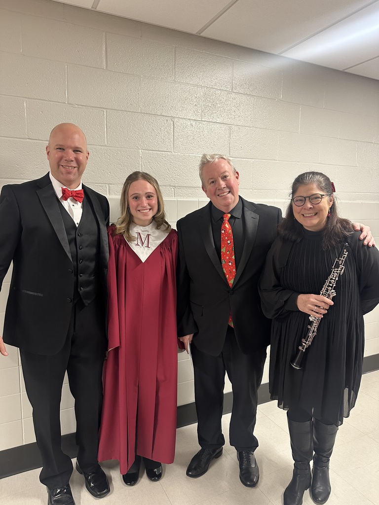 Musicians pose for a photo