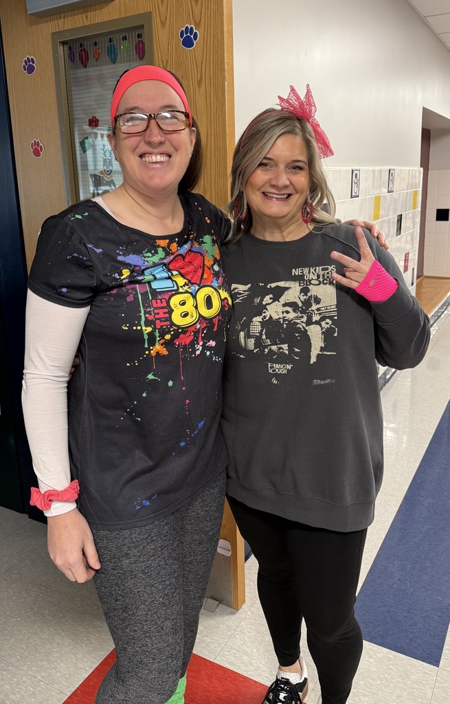 Teachers dressed for the 80s.