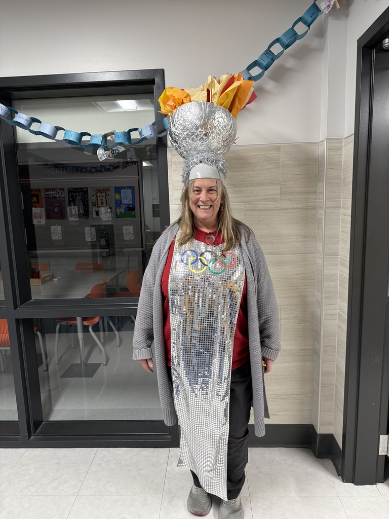 A staff member dressed like the olympic torch.