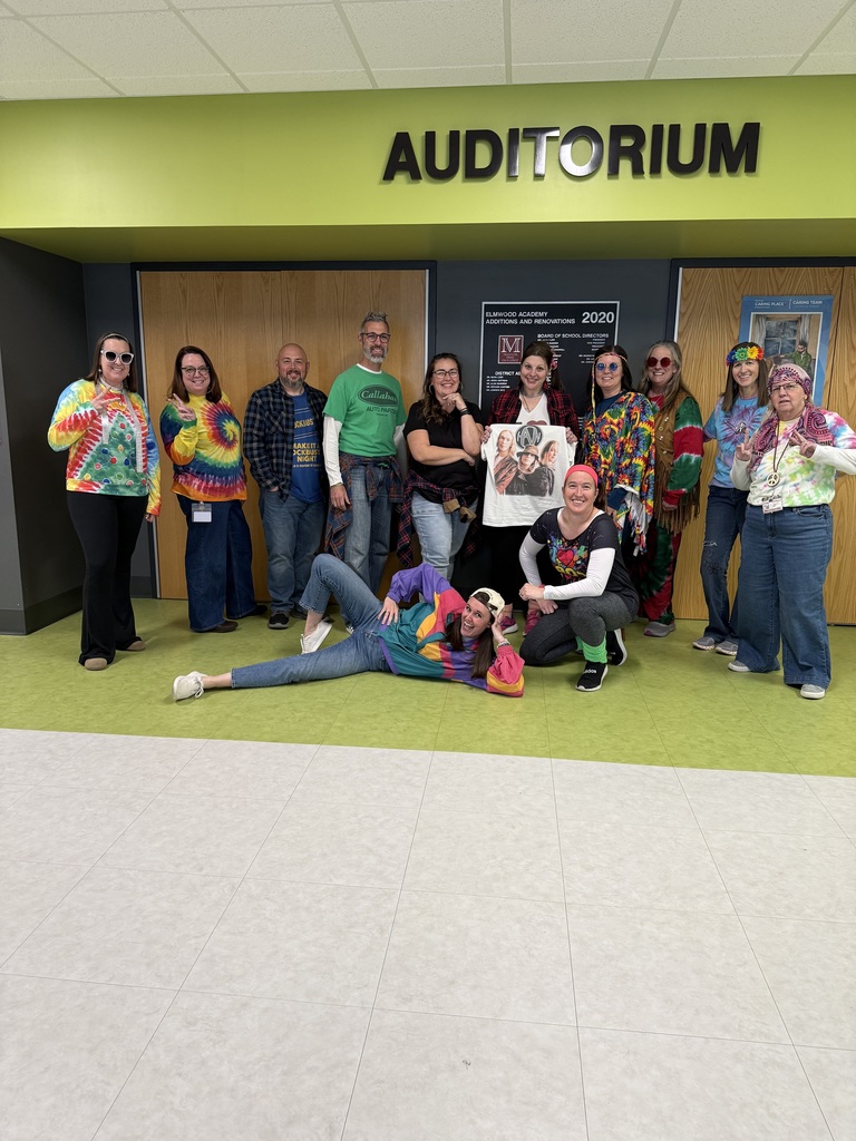 Teachers dressed from different decades.
