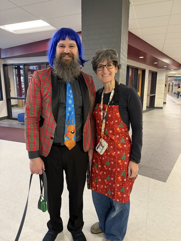 Teachers dressed in holiday flair.