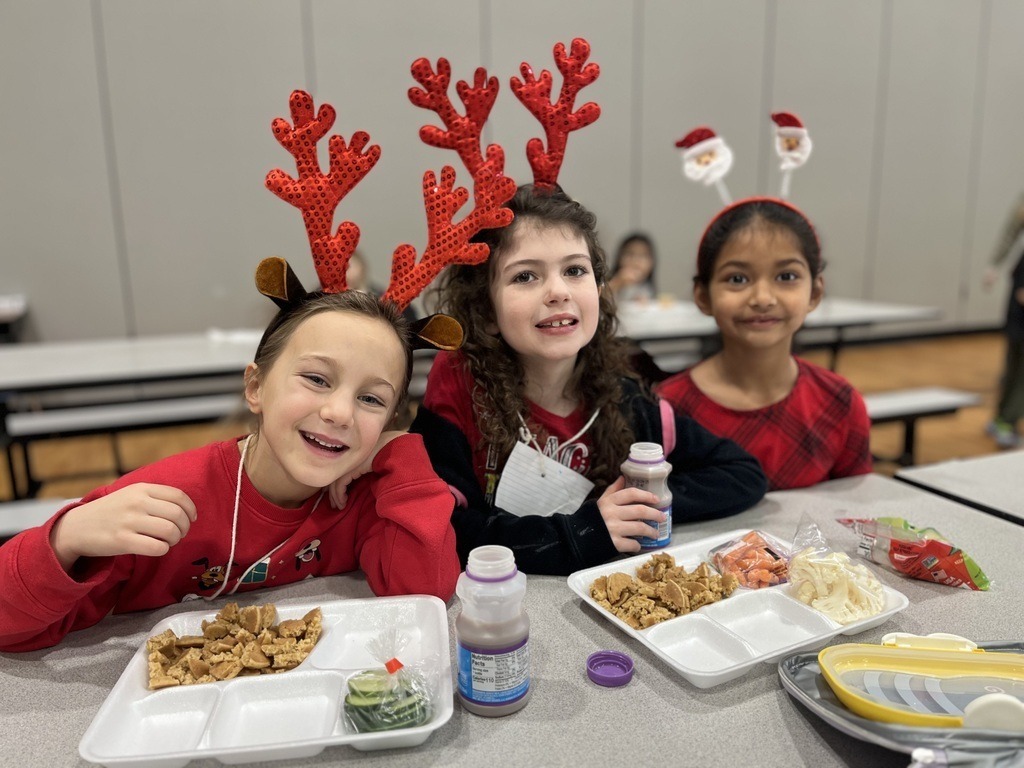 Students wearing festive flair on their heads.