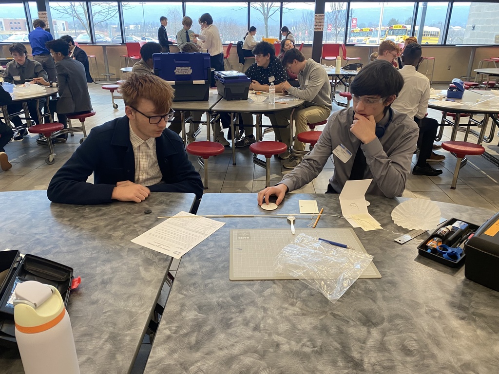 Students problem solve at a TSA competition.