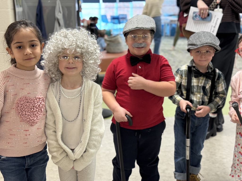 Young students dressed like they are 100 years old.