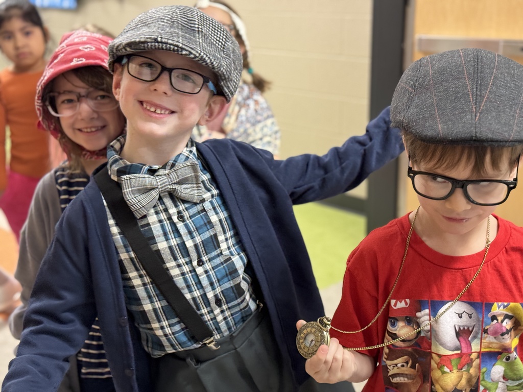 Young students dressed like they are 100 years old.