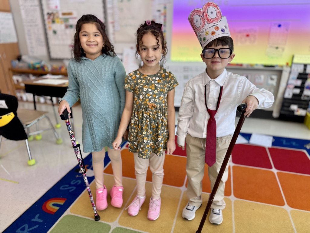 Young students dressed like they are 100 years old.