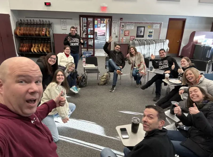 Staff gather for a selfie.
