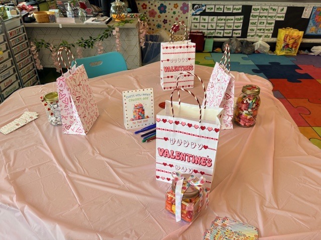 A table with valentine's day bags.