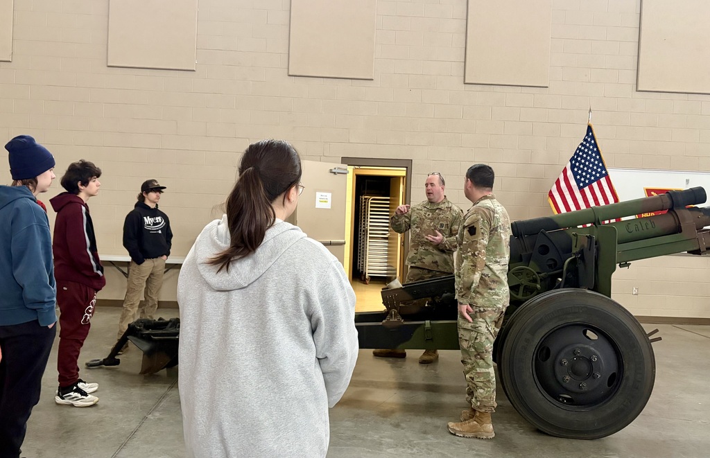 Students learning about fields in the military.