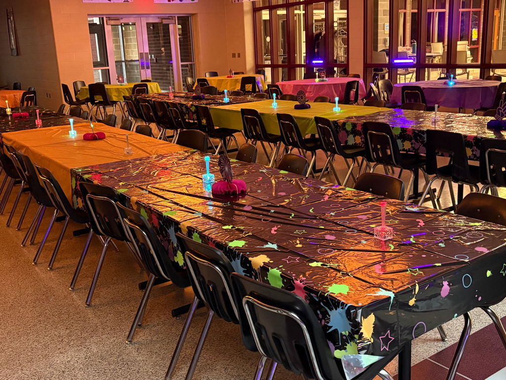 Glow in the dark decorations at a school dance.