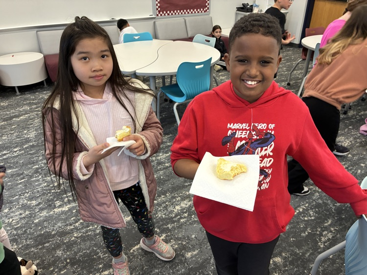 Students tasting food with homemade butter.