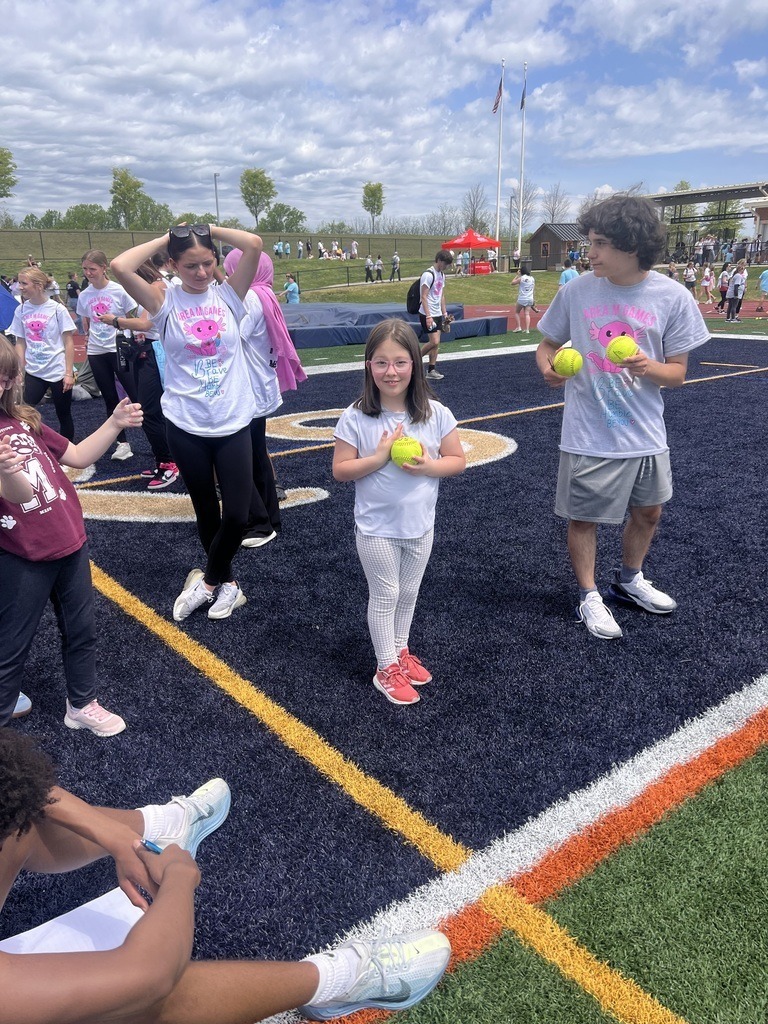 A young student athlete participating in teh special olympics.