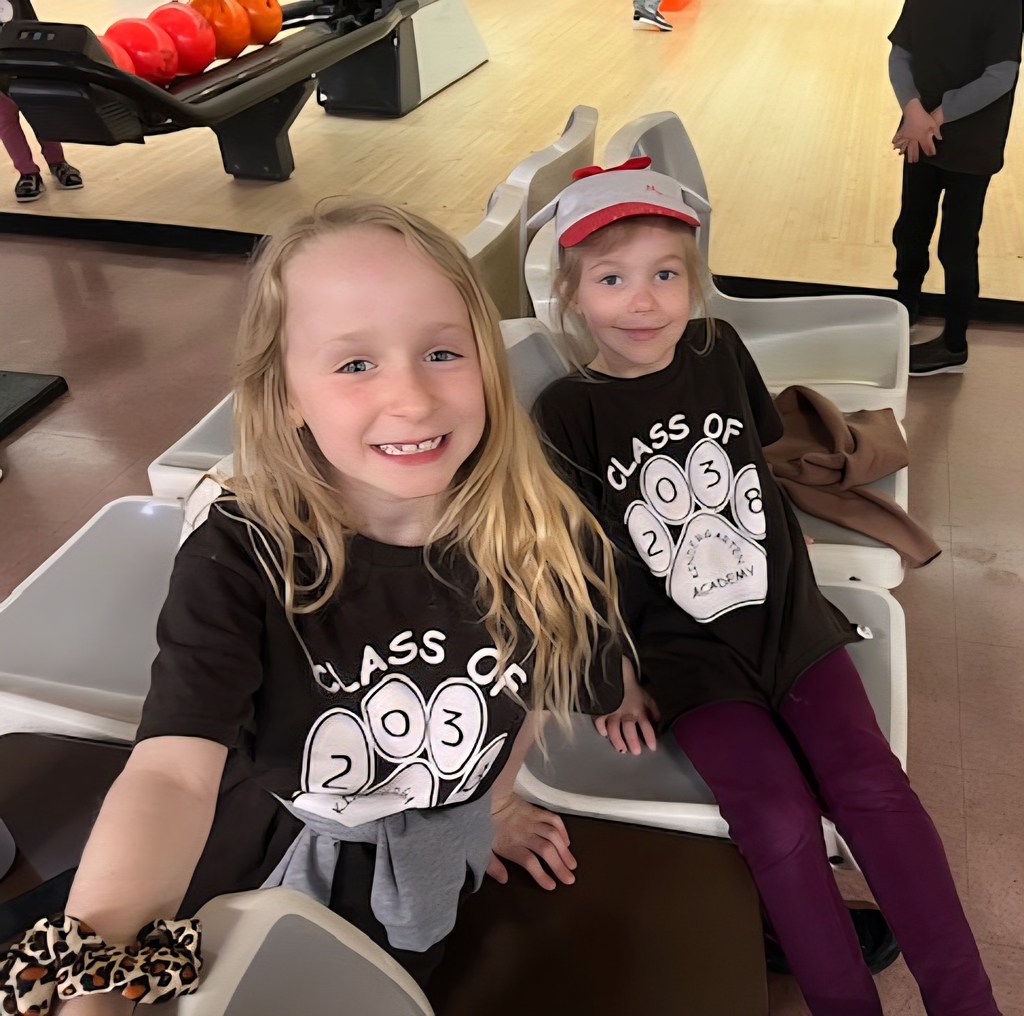 Friends smiling together for a photo.