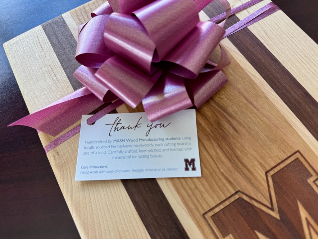 A bow with a thank you card.