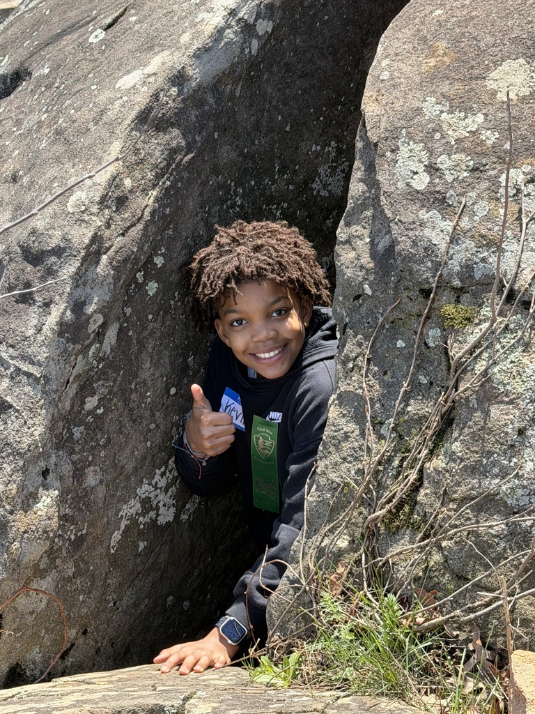 A student between two rocks at a national military park.