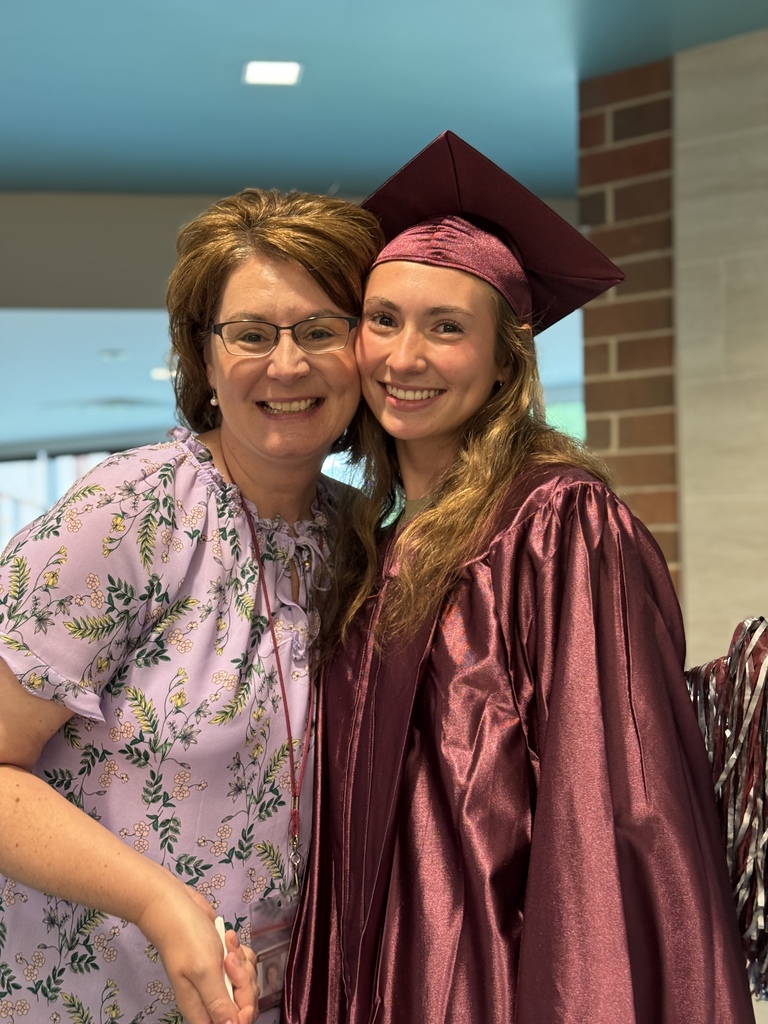 A proud mom with her graduate.