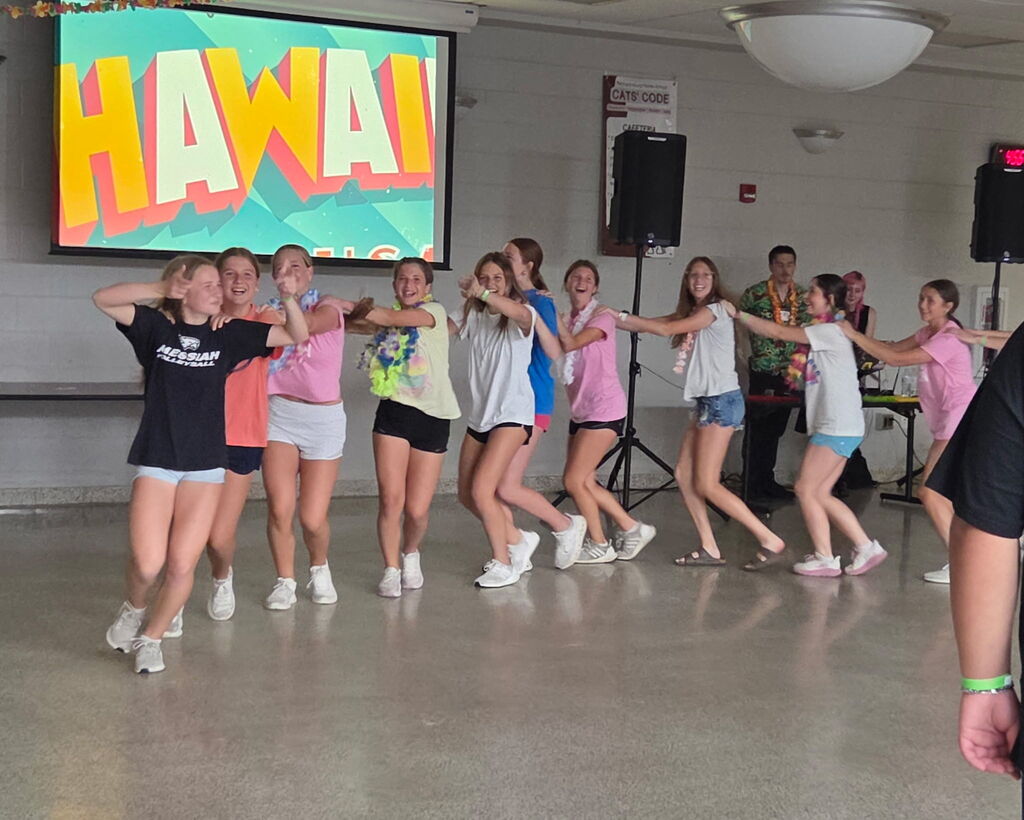 Students in a conga line.
