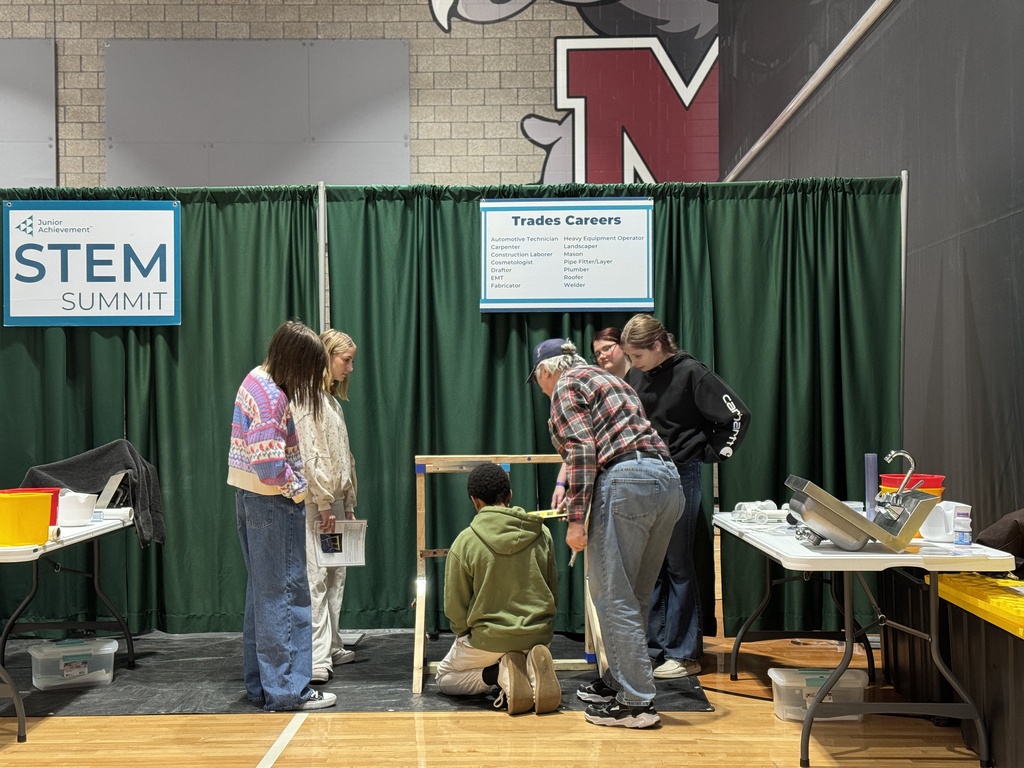 Students work together while exploring careers in the trades.