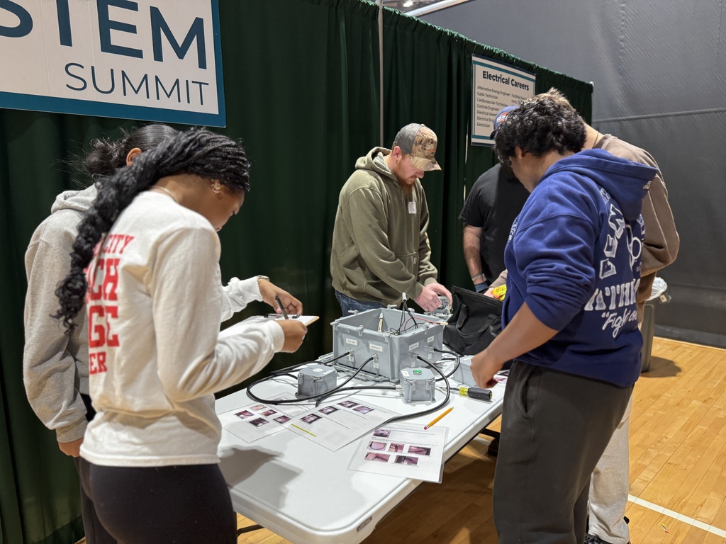 Students work together on a project while exploring electrical careers.