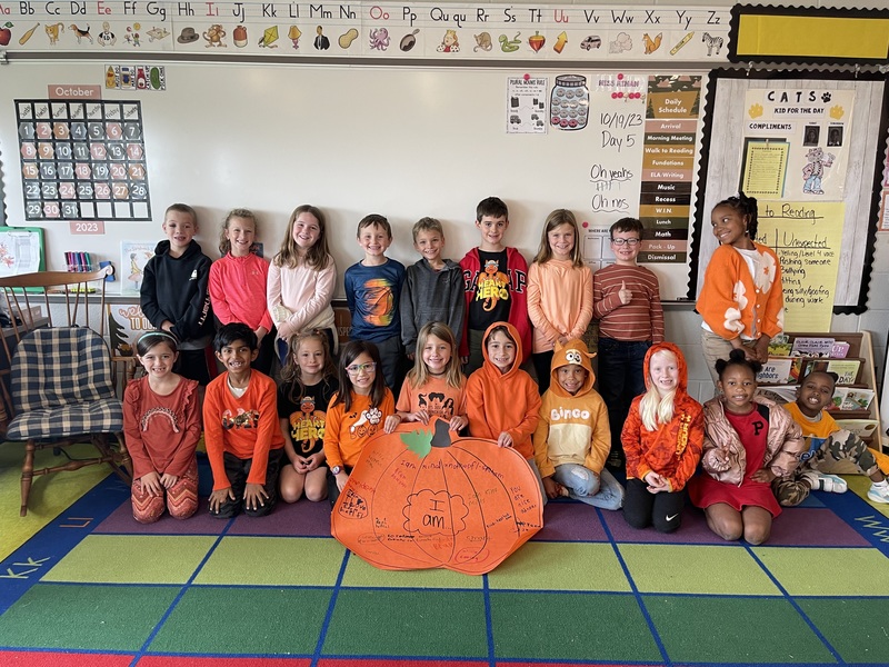image of students wearing orange in classroom