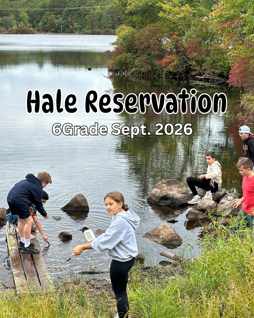 students fishing at a pond