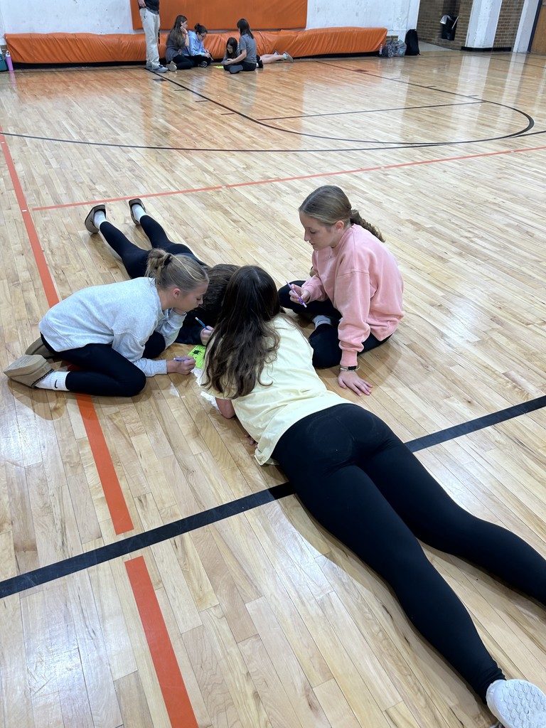 Students working with Leader in Me