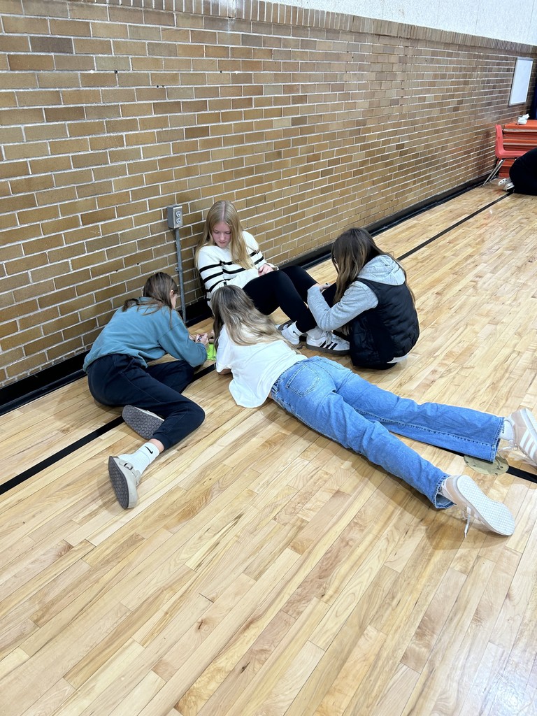 Students working with Leader in Me