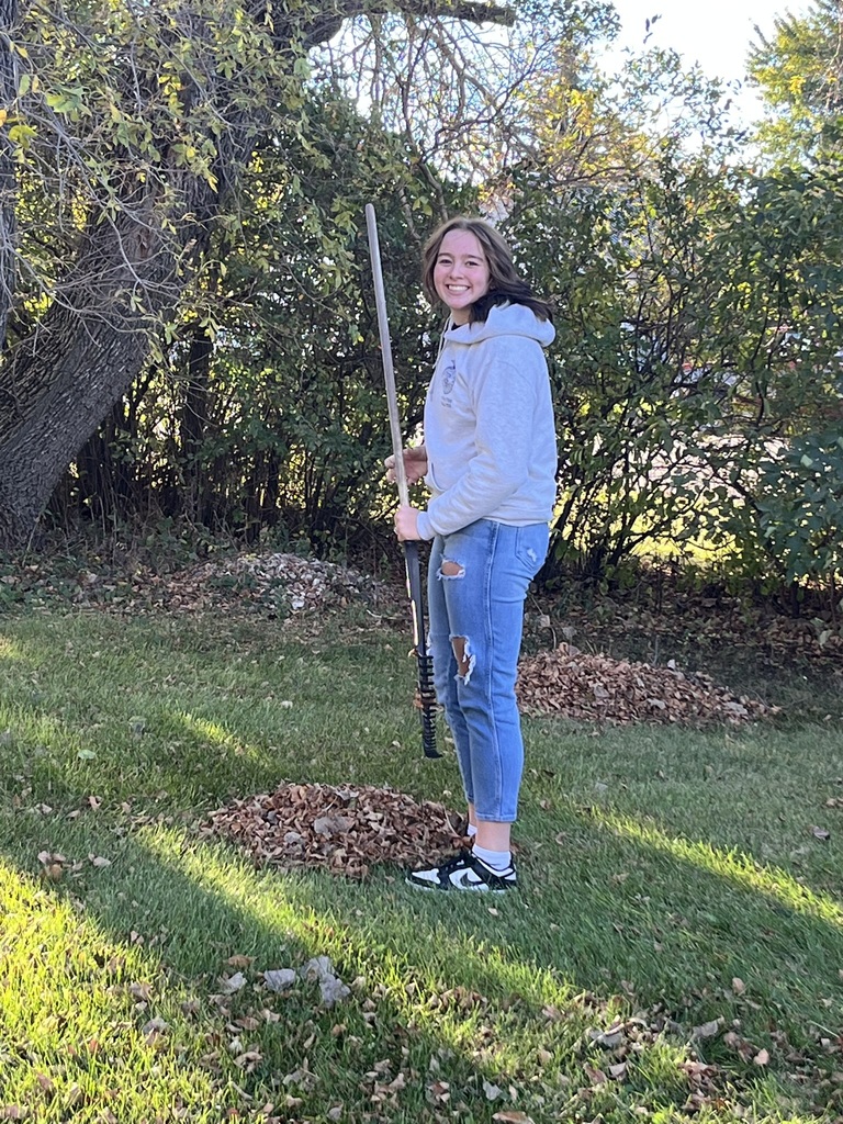 Raking leaves at the parsonage