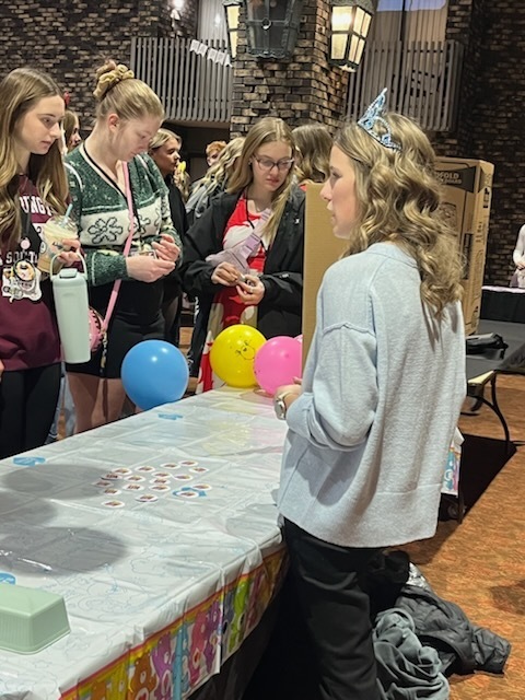 Visiting with a candidate for the State Student Council Board