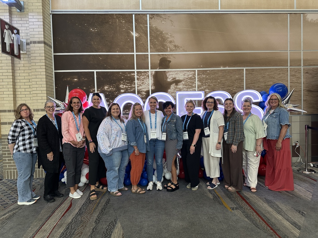 A group of teachers at a conference