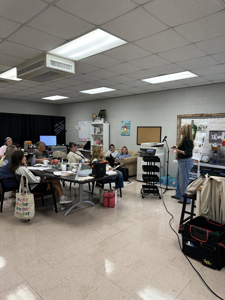 Teacher's in a PD session.