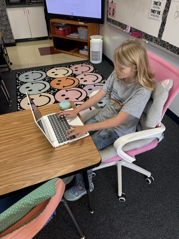 S.H practicing her typing 