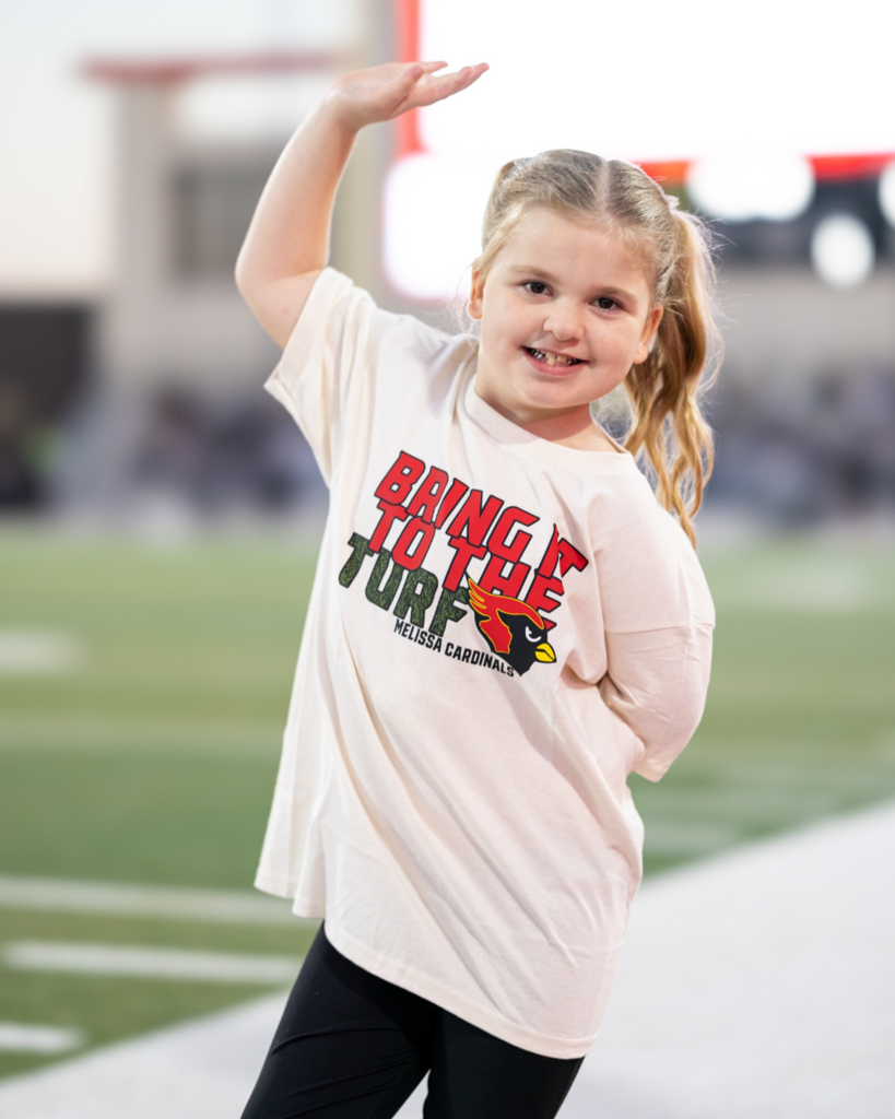 Penny Smiling in Coach Kenny Deel Stadium before the Varsity Football Game
