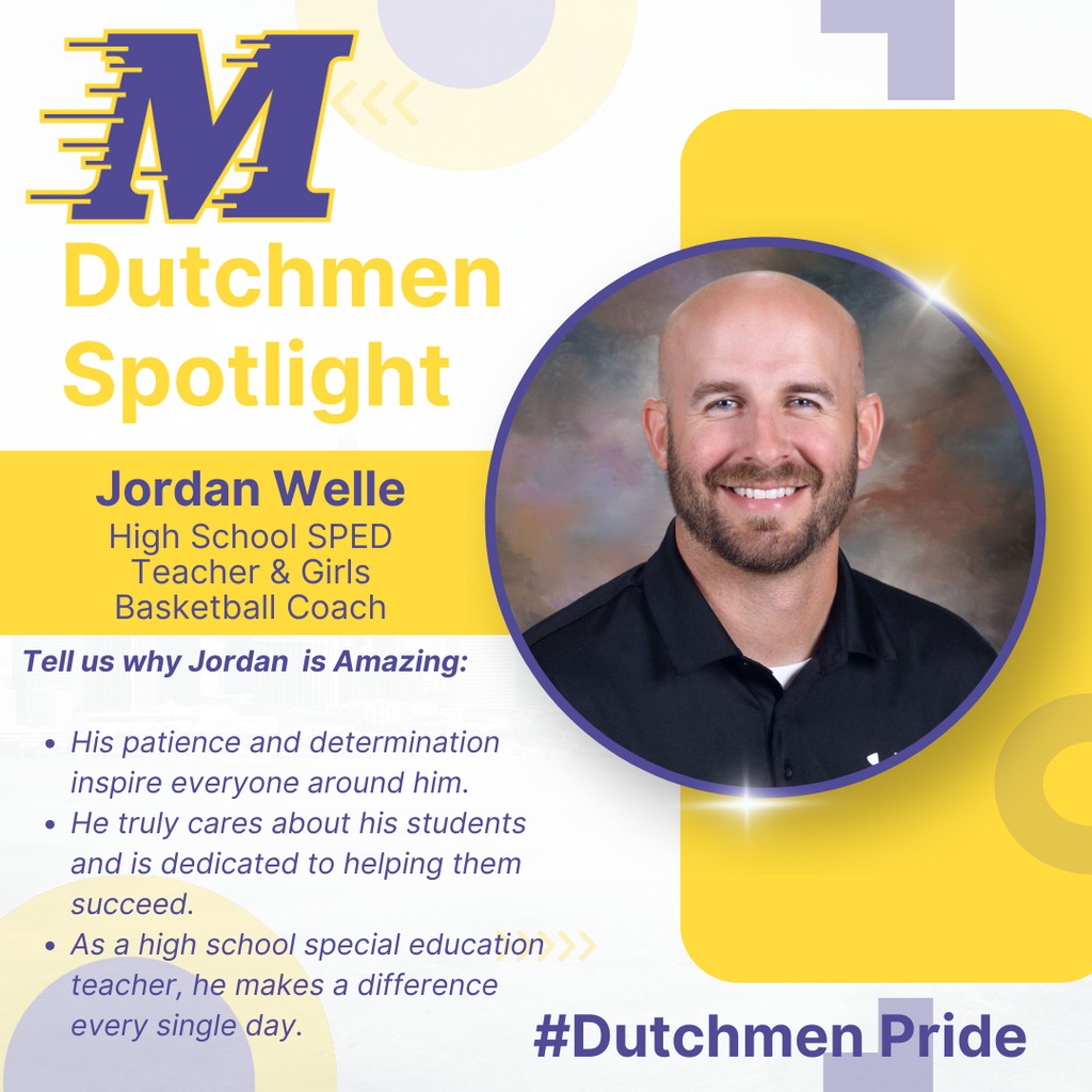 man and black polo with beard and no hair with a nice smile