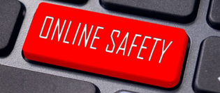 Keyboard with red button with online safety on it