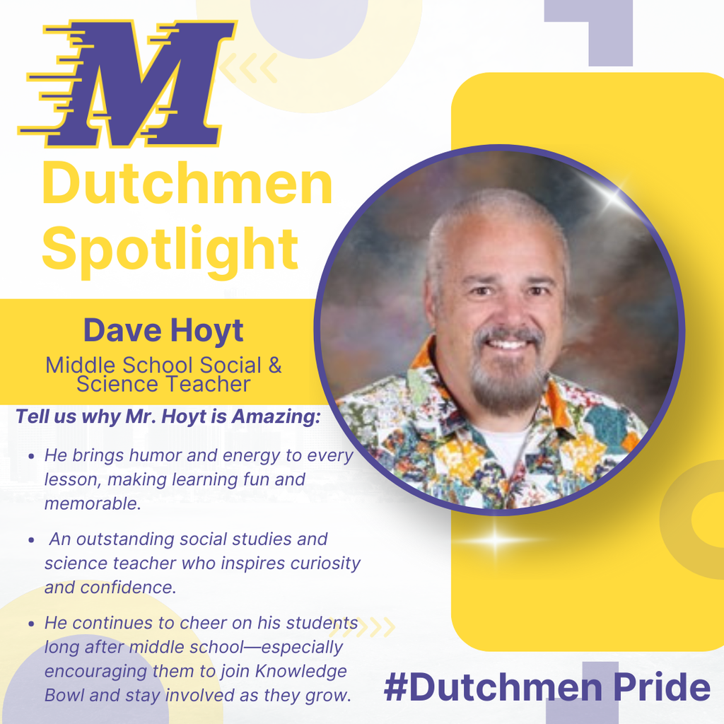 man in multicolor shirt, short grey hair and grey goatee and a smile