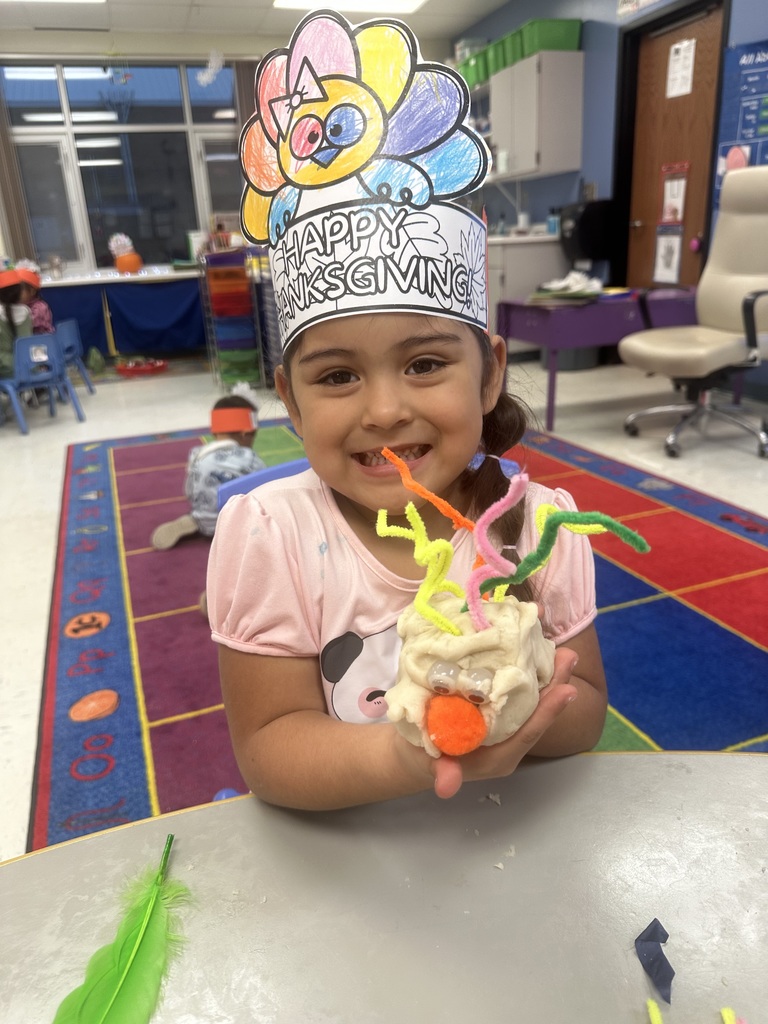 girl with dark hair and turkey crown