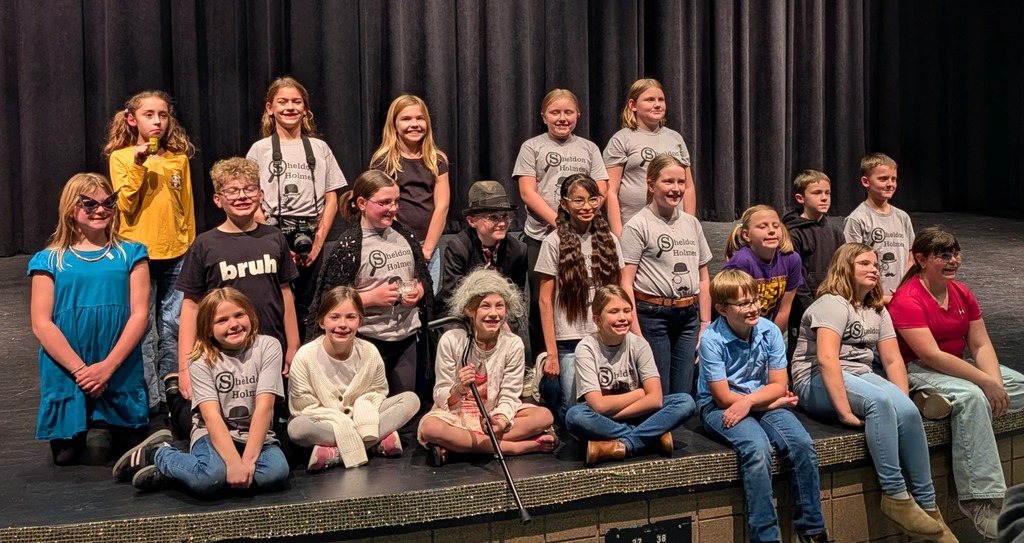 Group of kids posed for a group theatre photo