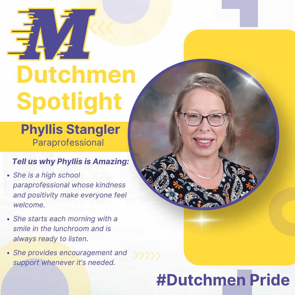 woman with a black paisley shirt, blonde hair and glasses in school photo style picture