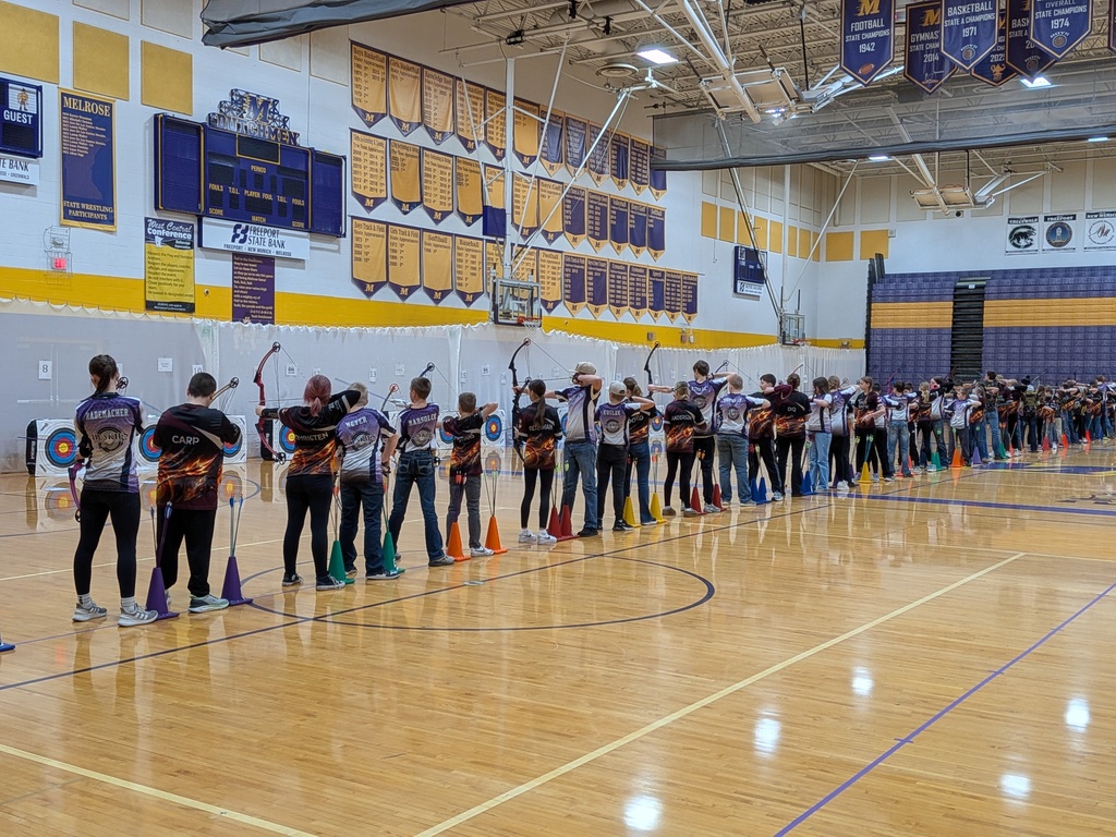 archers in lines shooting at targets