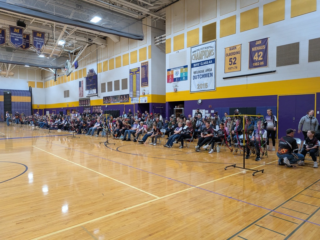 People sitting in a gym