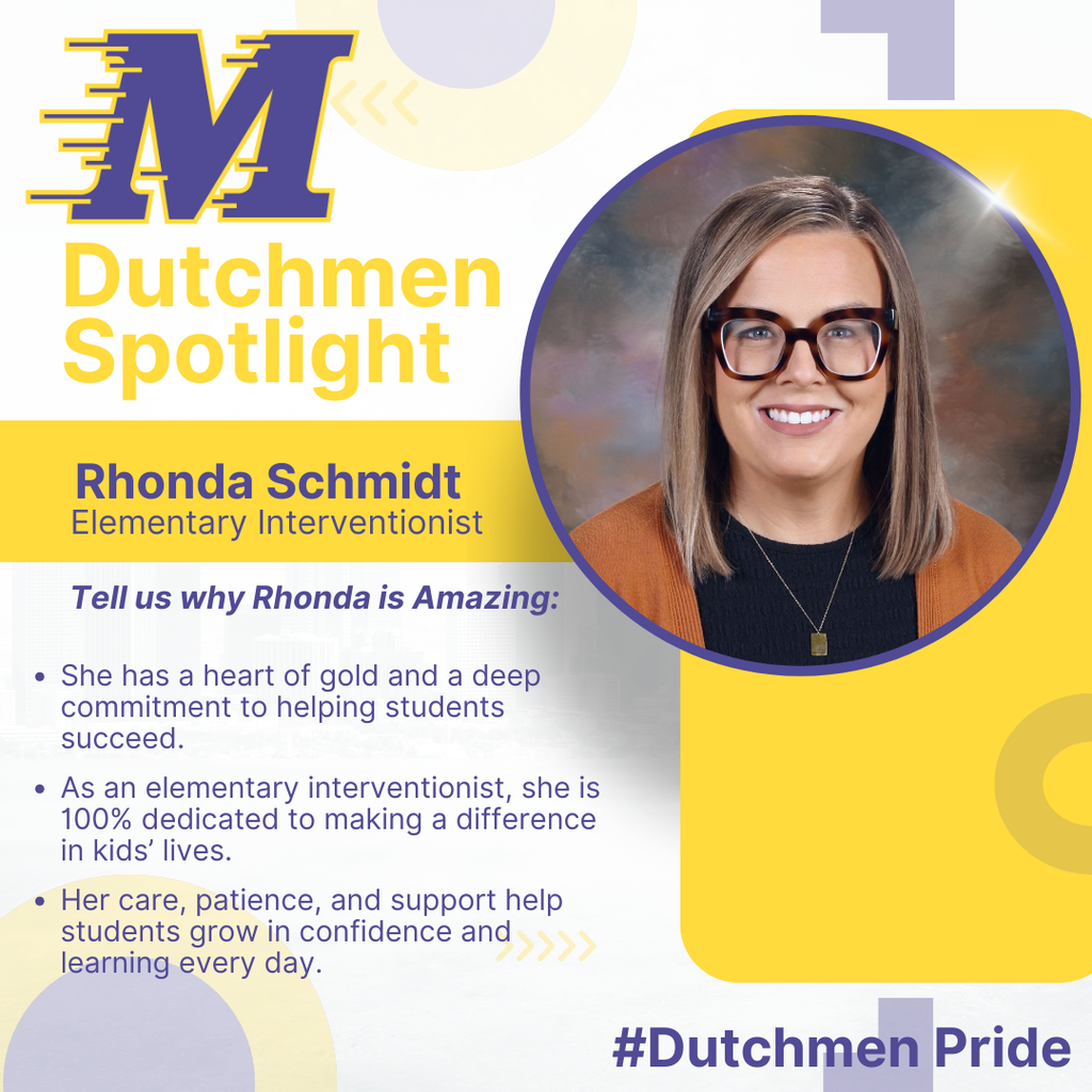 Woman in black shirt, brown sweater, and big brown glassses smiling in a school photo