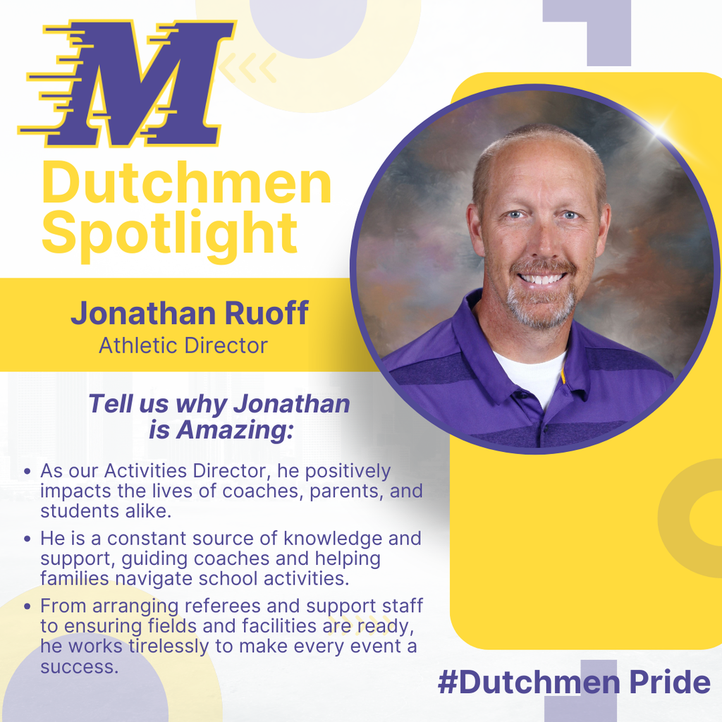 man in purple and dark purple polo shirt goatee and a smile