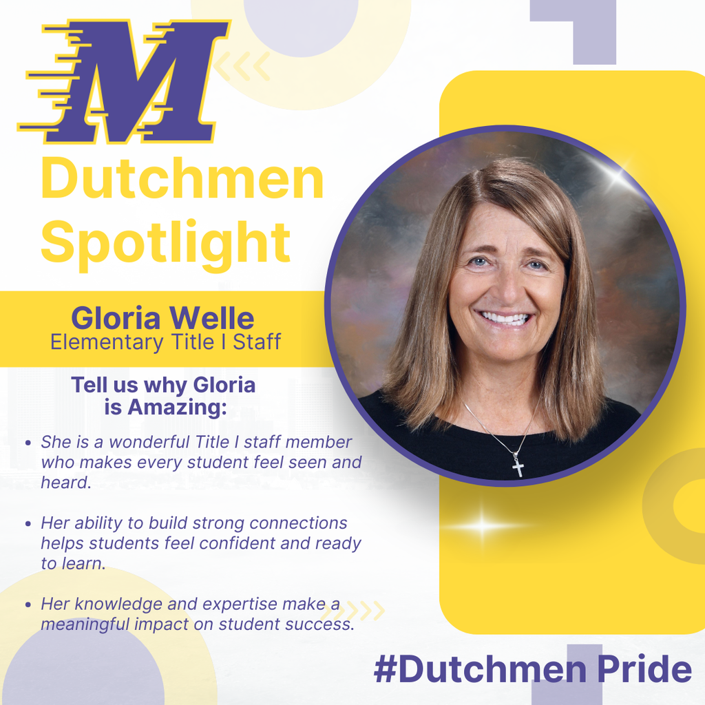 Woman in black shirt, silver cross necklace, brown hair and a smile