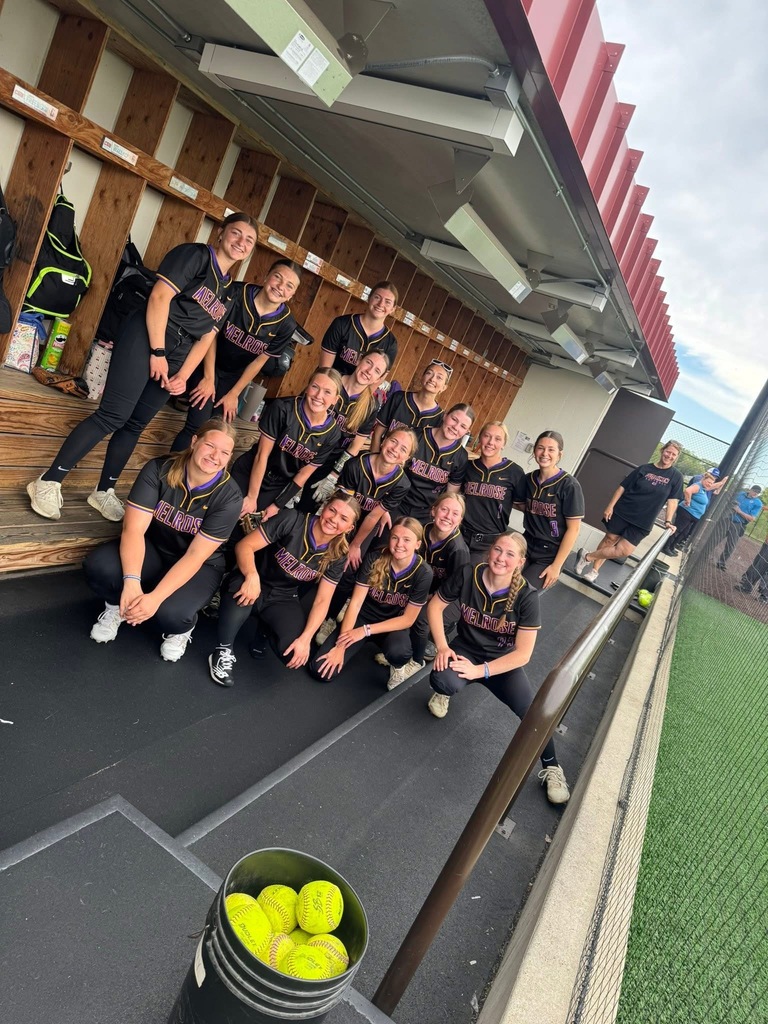 Softball team in the dugout