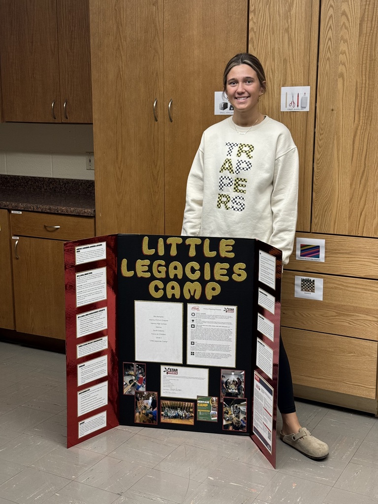 Ella  Rempfer and with her project board. 