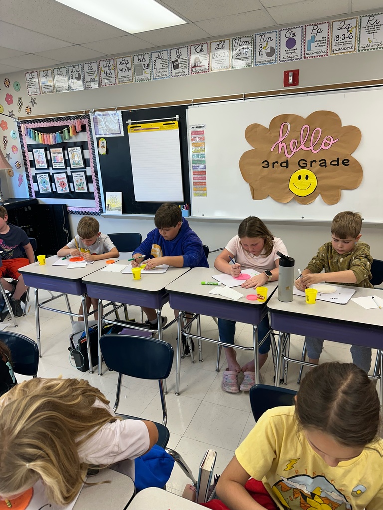 Photo shows Zitzman Elementary 3rd graders bringing multiplication to life as they learn how to solve problems.