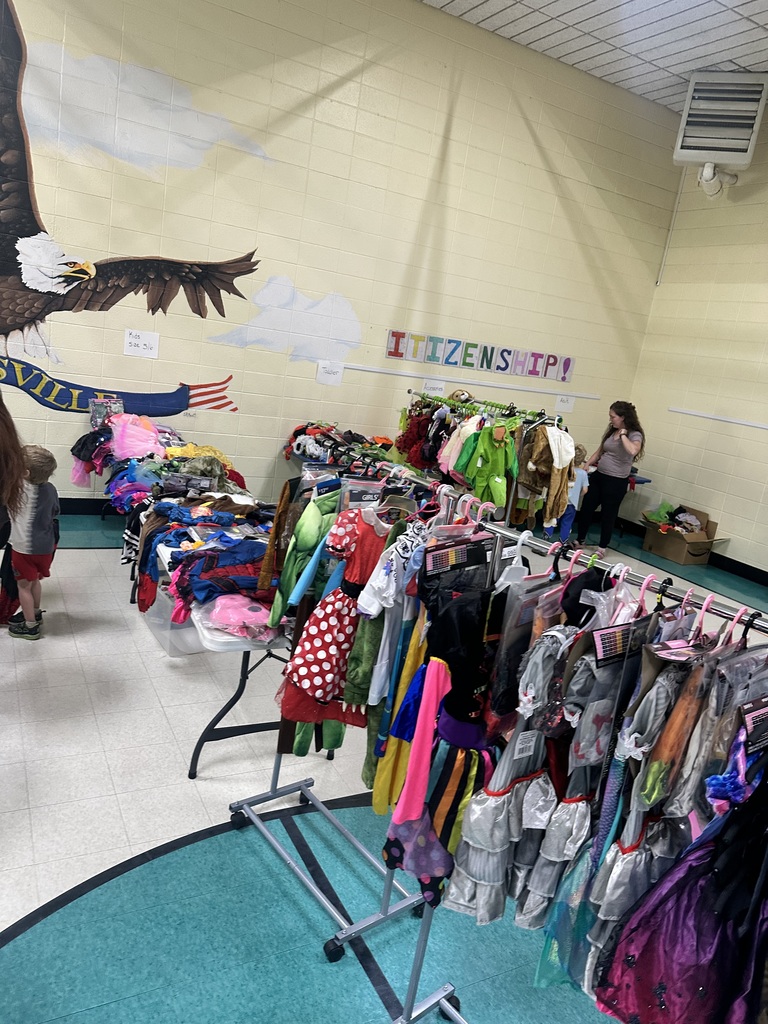 Photo shows the annual Costume Closet event at Robertsville Elementary