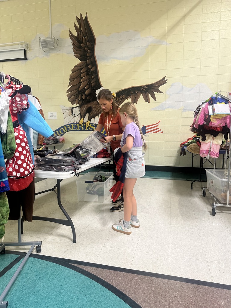 Photo shows the annual Costume Closet event at Robertsville Elementary