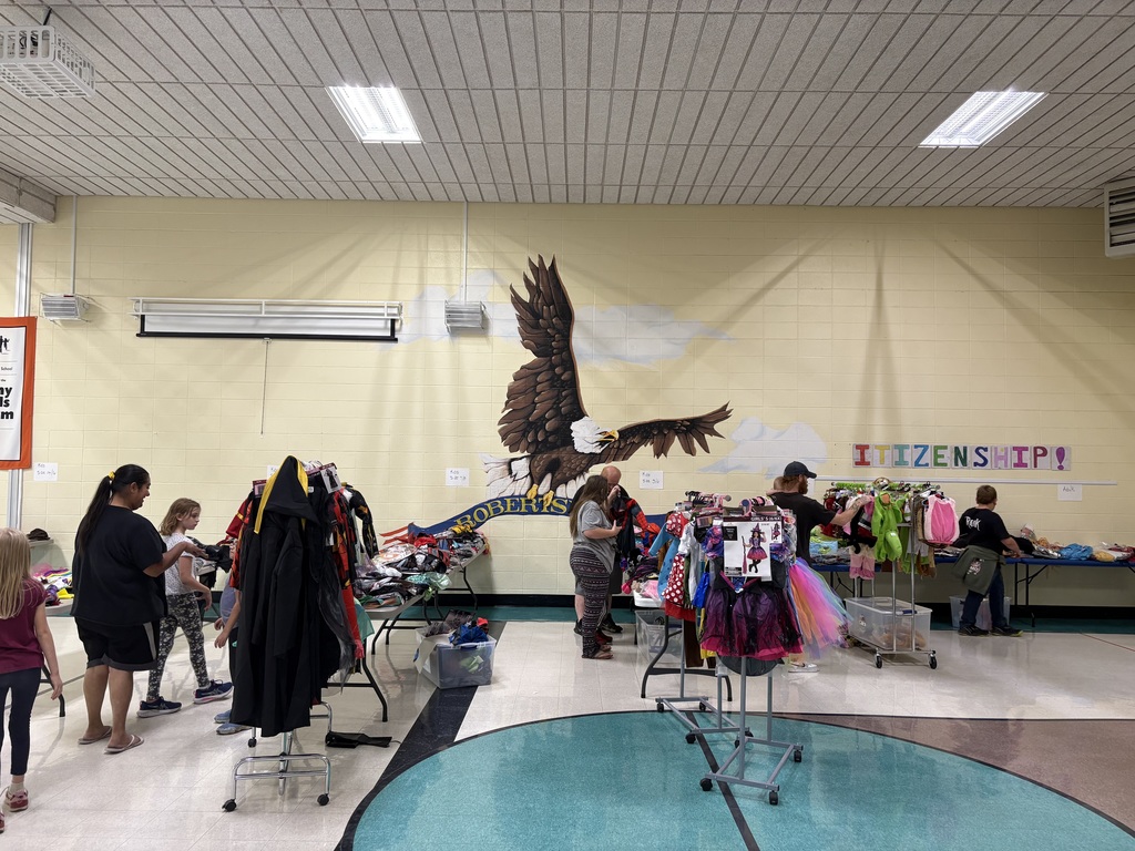 Photo shows the annual Costume Closet event at Robertsville Elementary